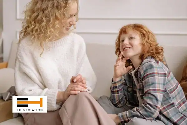 Happy mother and child after sorting child arrangements mediation Bury